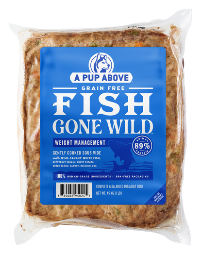 Vacuum-sealed package of brown gently cooked dog food with blue label showing "A Pup Above Fish Gone Wild" branding.