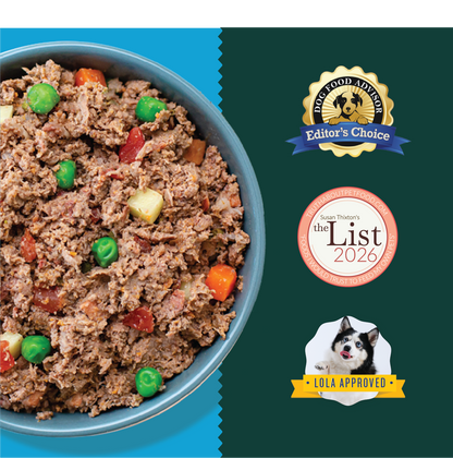 Ground beef stew with peas, carrots, and diced vegetables in a blue bowl.