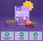 Purple "A Pup Above" grain-free turducken recipe pet food package with bowl of kibble, apple, green beans, and cranberries on